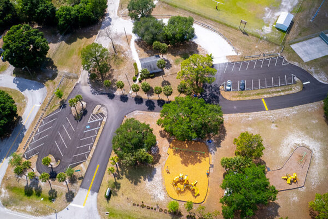 completed asphalt paving private roadway, parking lot, and striping