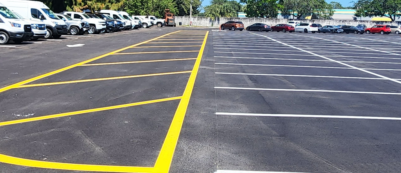 asphalt paved parking lot with striping
